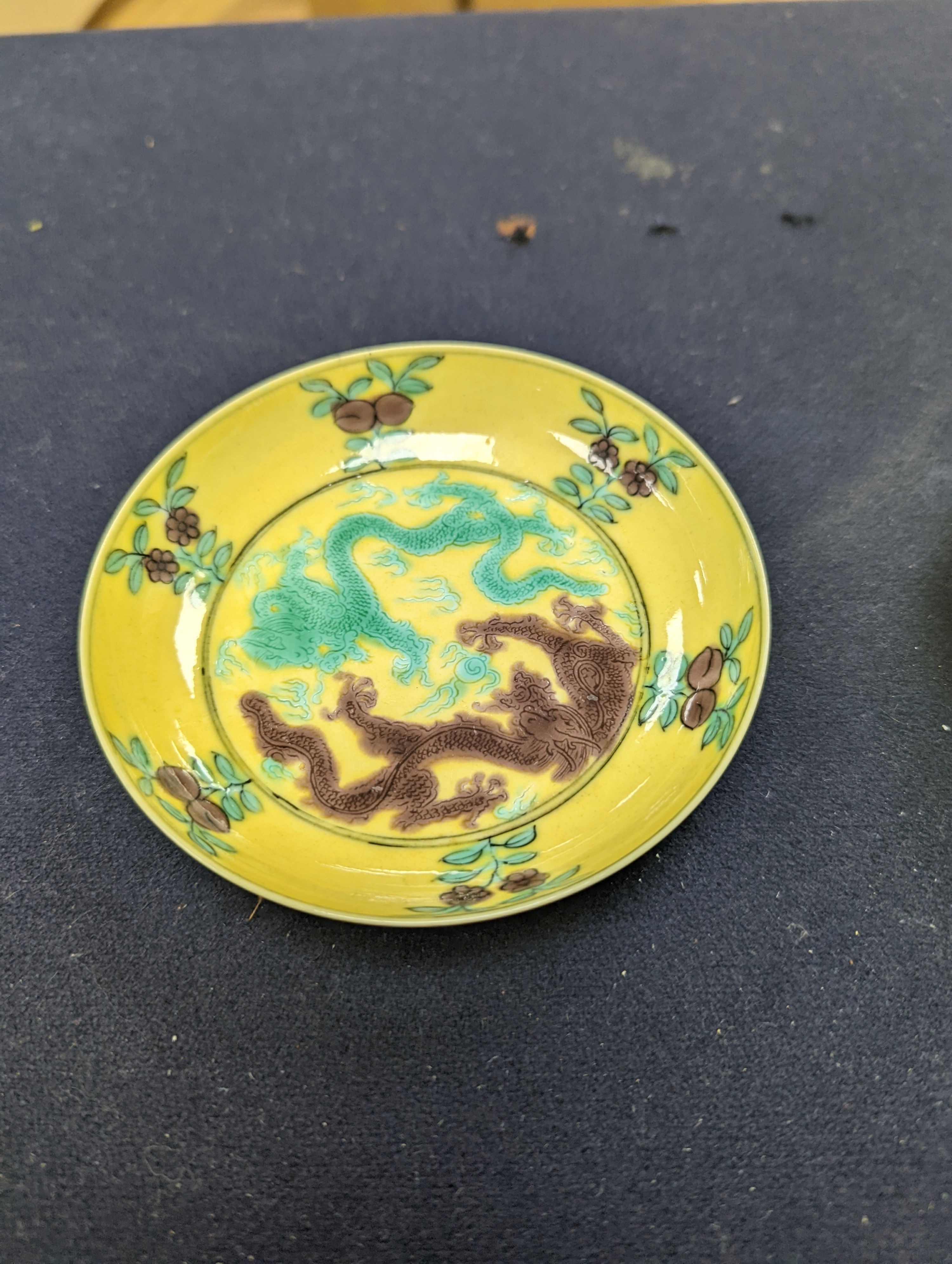 A pair of Chinese yellow, green and aubergine dragon dishes, Guangxu marks, 10cm.